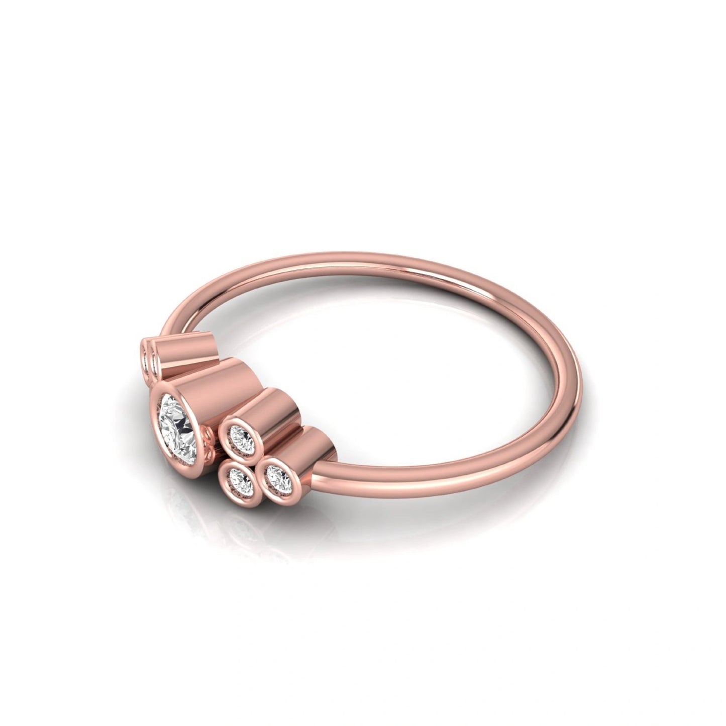 Rose-gold ring with three circular gemstones on a white background