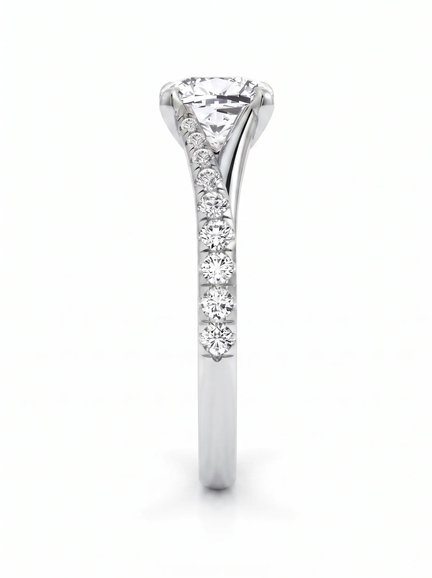 Cushion cut lab grown diamond split shank pavé engagement ring with four-prong setting and white gold band.