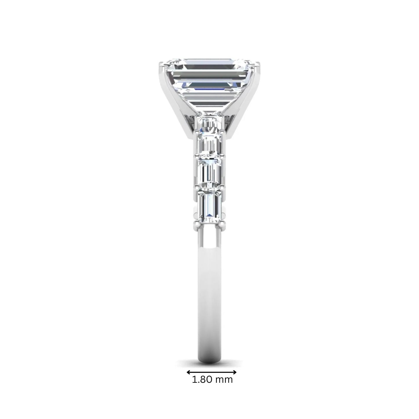 Emerald cut lab grown diamond engagement ring with baguette side diamonds in a four-prong solitaire accent setting and white gold tone band.