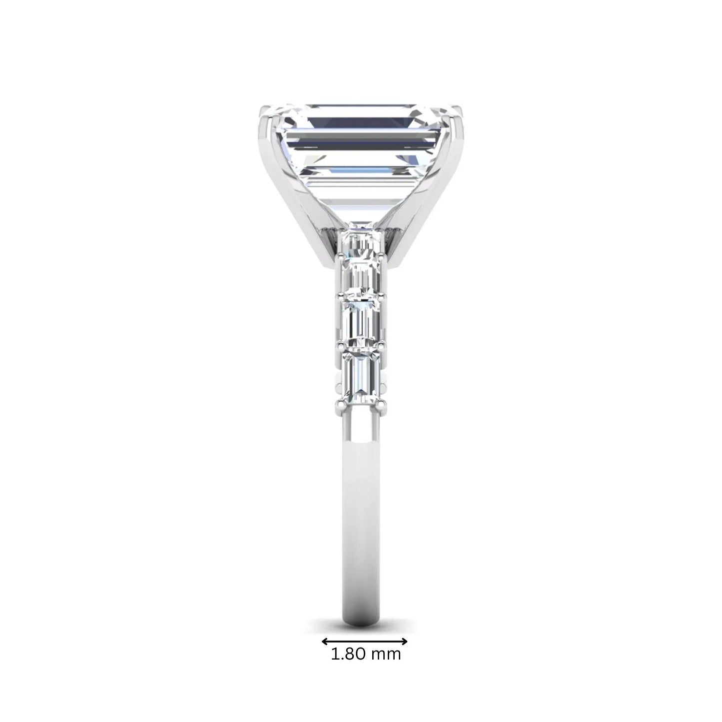 Emerald cut lab grown diamond engagement ring with baguette side diamonds in a four-prong solitaire accent setting and white gold tone band.