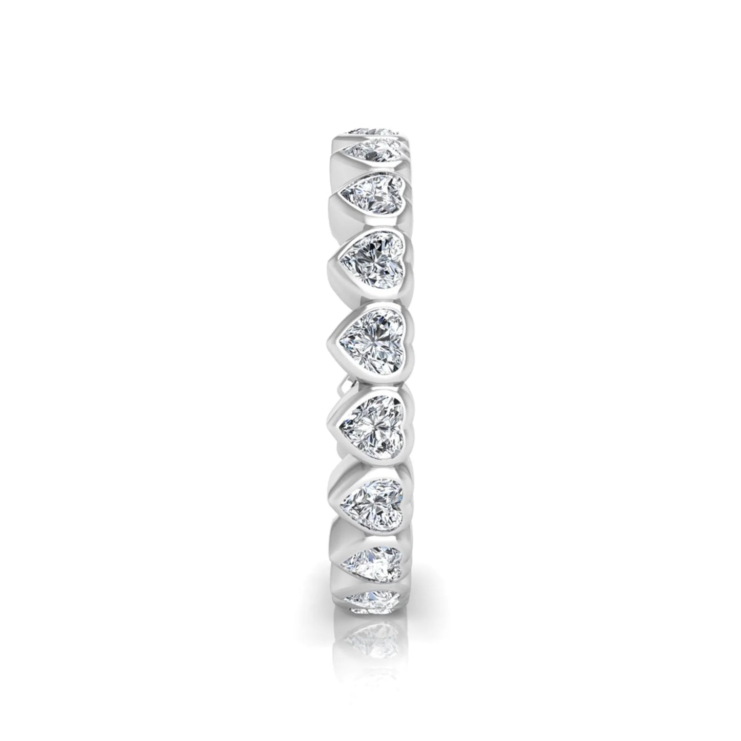 Heart cut lab grown diamond eternity band featuring 3.20 carats of heart-shaped diamonds in a shared-prong setting with a polished white gold finish.
