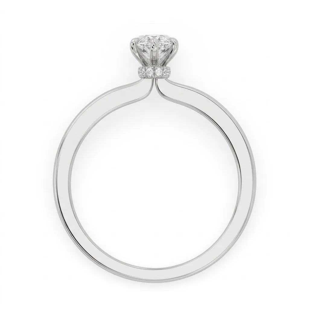 IGI Certified 1.10 carat marquise cut lab grown diamond solitaire engagement ring with hidden halo in white gold.