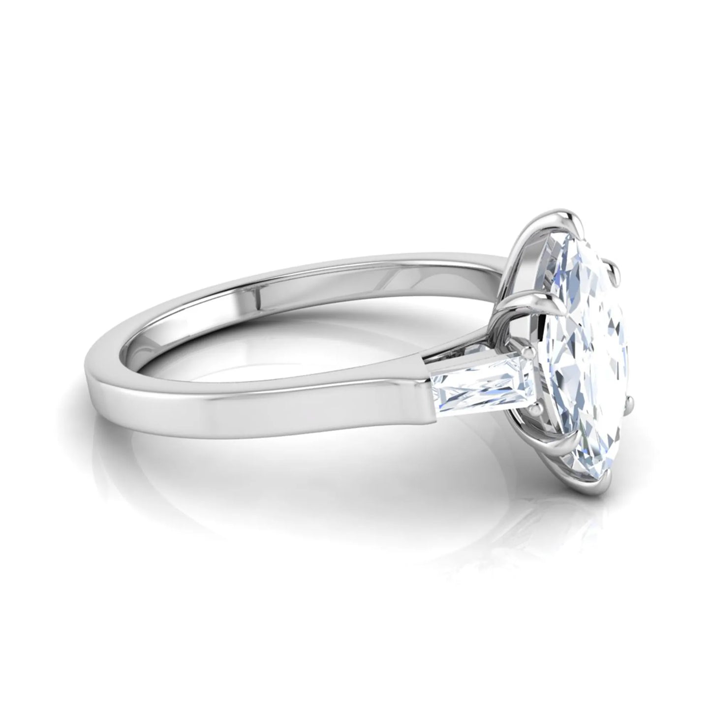 Marquise cut lab grown diamond engagement ring featuring a 0.95 carat IGI certified center diamond with baguette side diamonds in a white gold three stone setting.