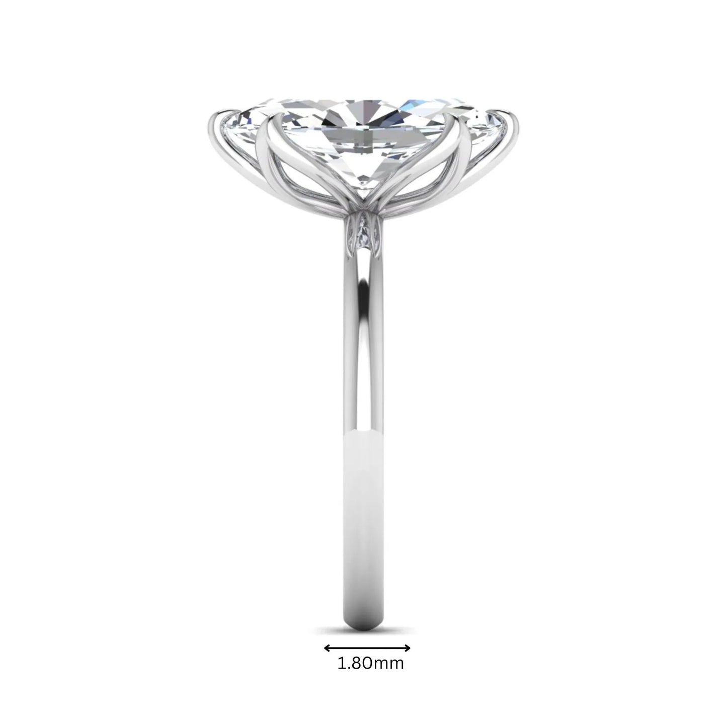 Marquise cut lab grown diamond solitaire engagement ring with six prong setting in white gold tone featuring an elongated elegant design.