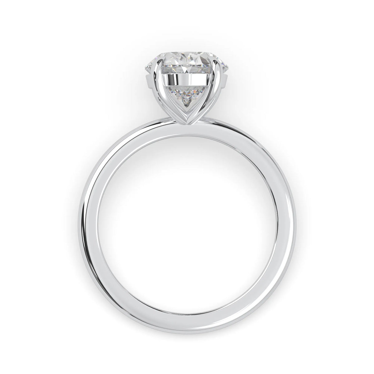 white-gold ring with a heart-shaped diamond on a white background