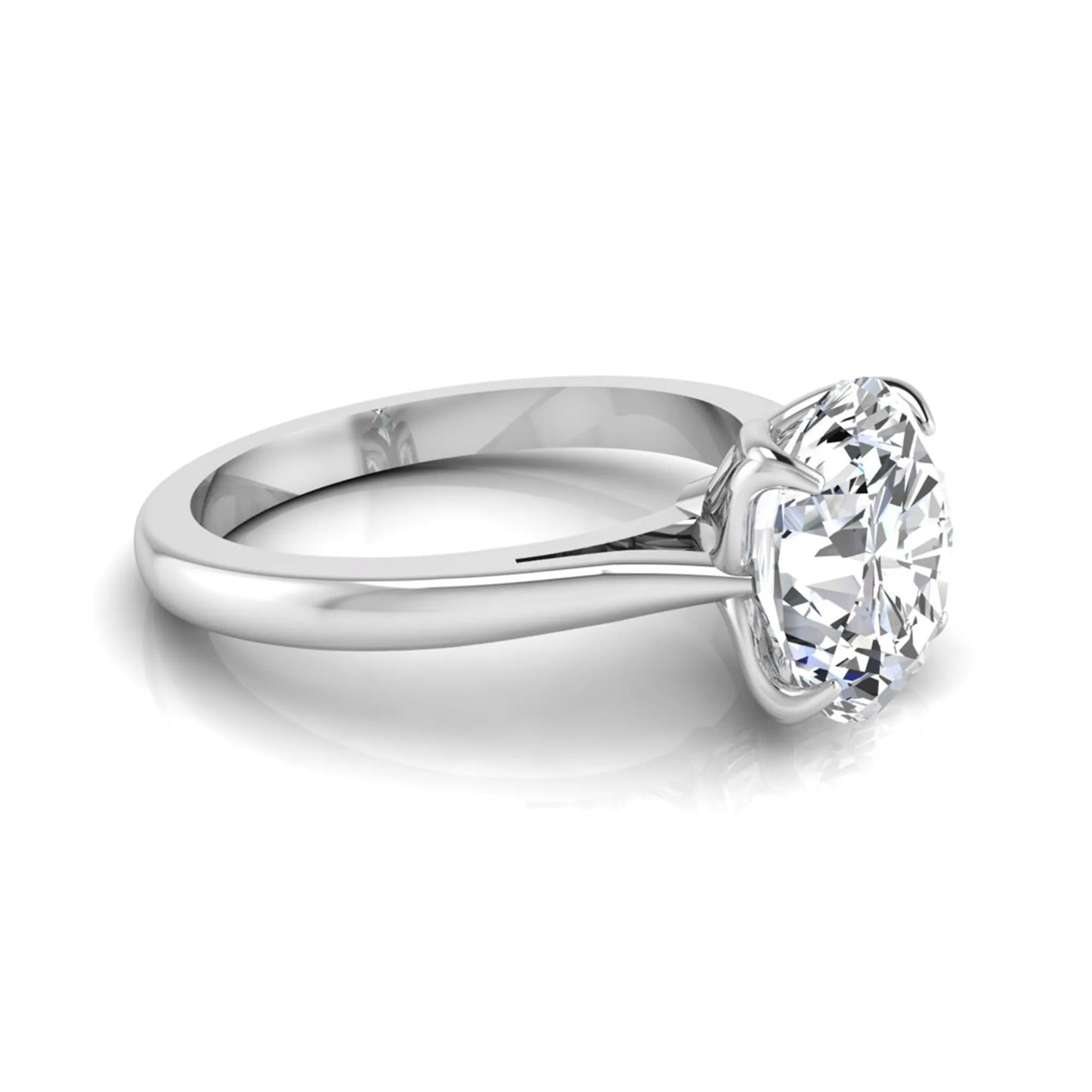 Oval cut lab grown diamond solitaire engagement ring featuring a classic four-prong setting with a white gold tone band.