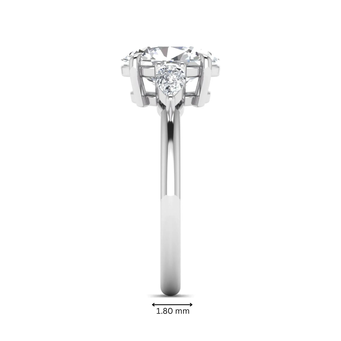 Oval cut lab grown diamond three stone engagement ring with pear cut side diamonds in a prong setting on a polished white gold band.