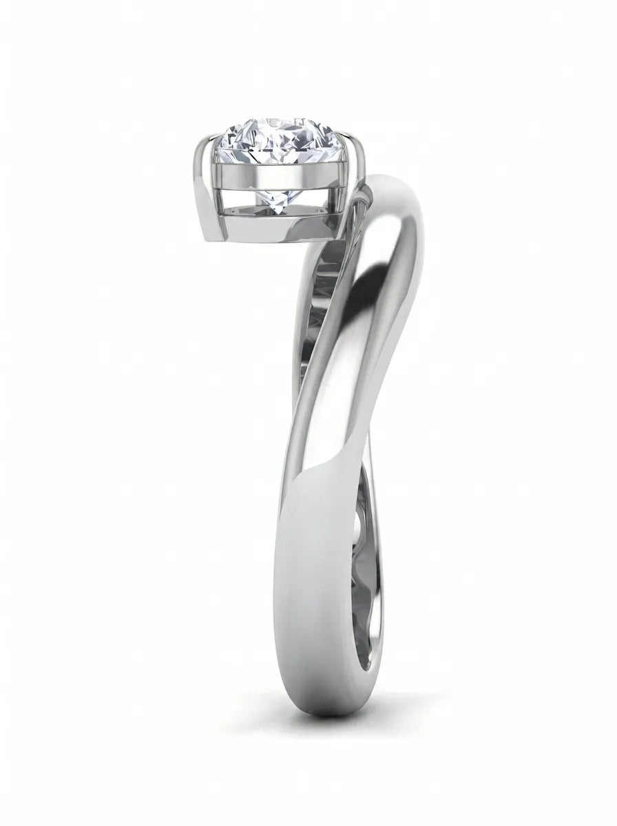 Pear cut lab grown diamond curved solitaire engagement ring with a four-prong setting in white gold