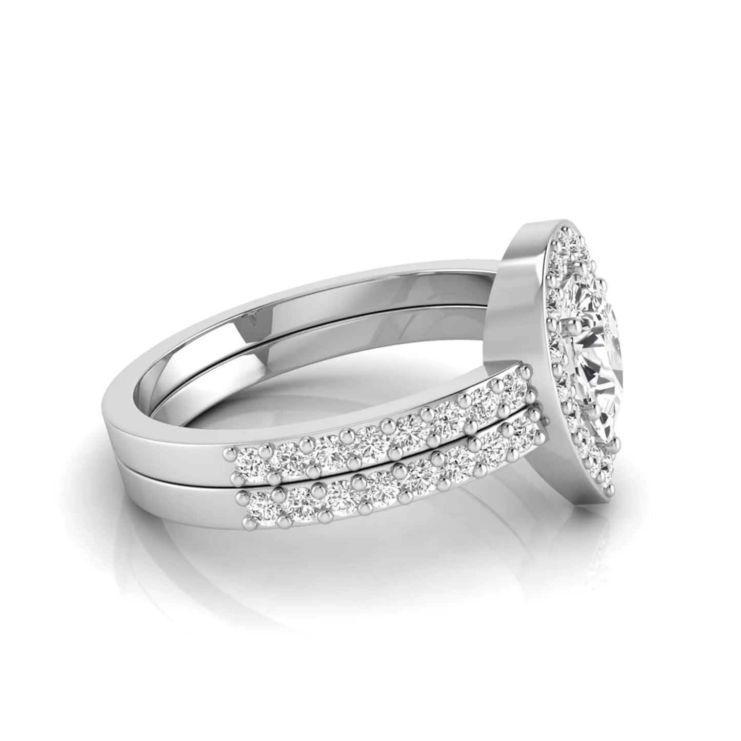 Pear cut lab grown diamond engagement ring with a round diamond halo and double-row pavé band in a white gold style design.
