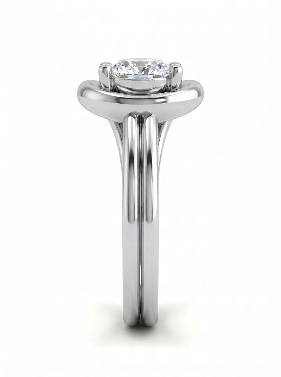 Pear cut lab grown diamond open frame solitaire engagement ring in a white gold teardrop setting