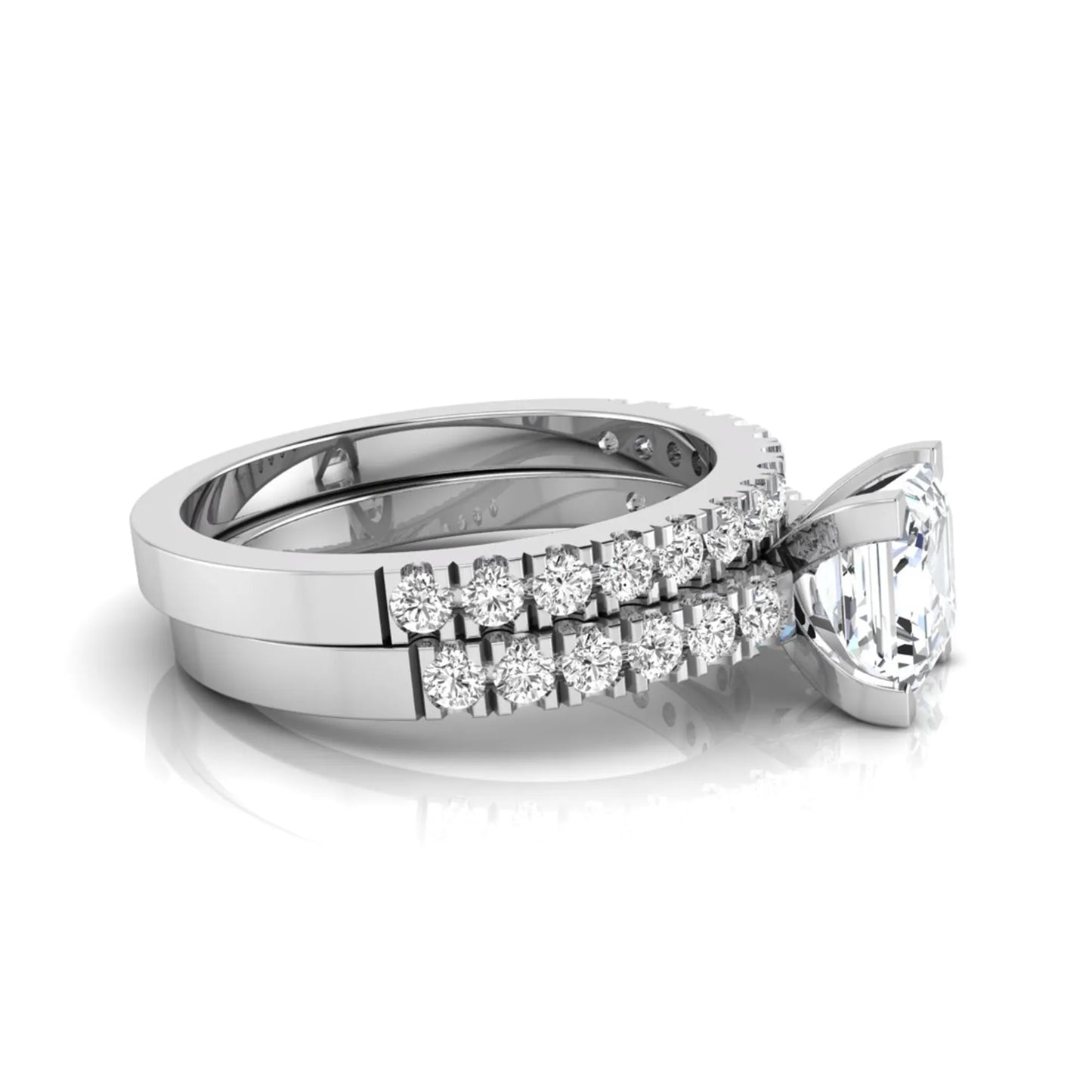 Princess cut lab grown diamond solitaire bridal ring set featuring a four-prong engagement ring with a matching pavé diamond wedding band in white gold.