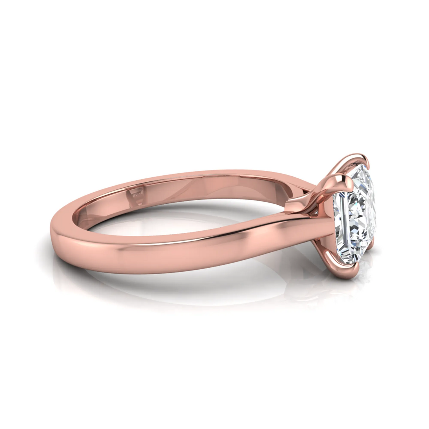 Rose-gold ring with a diamond on a white background