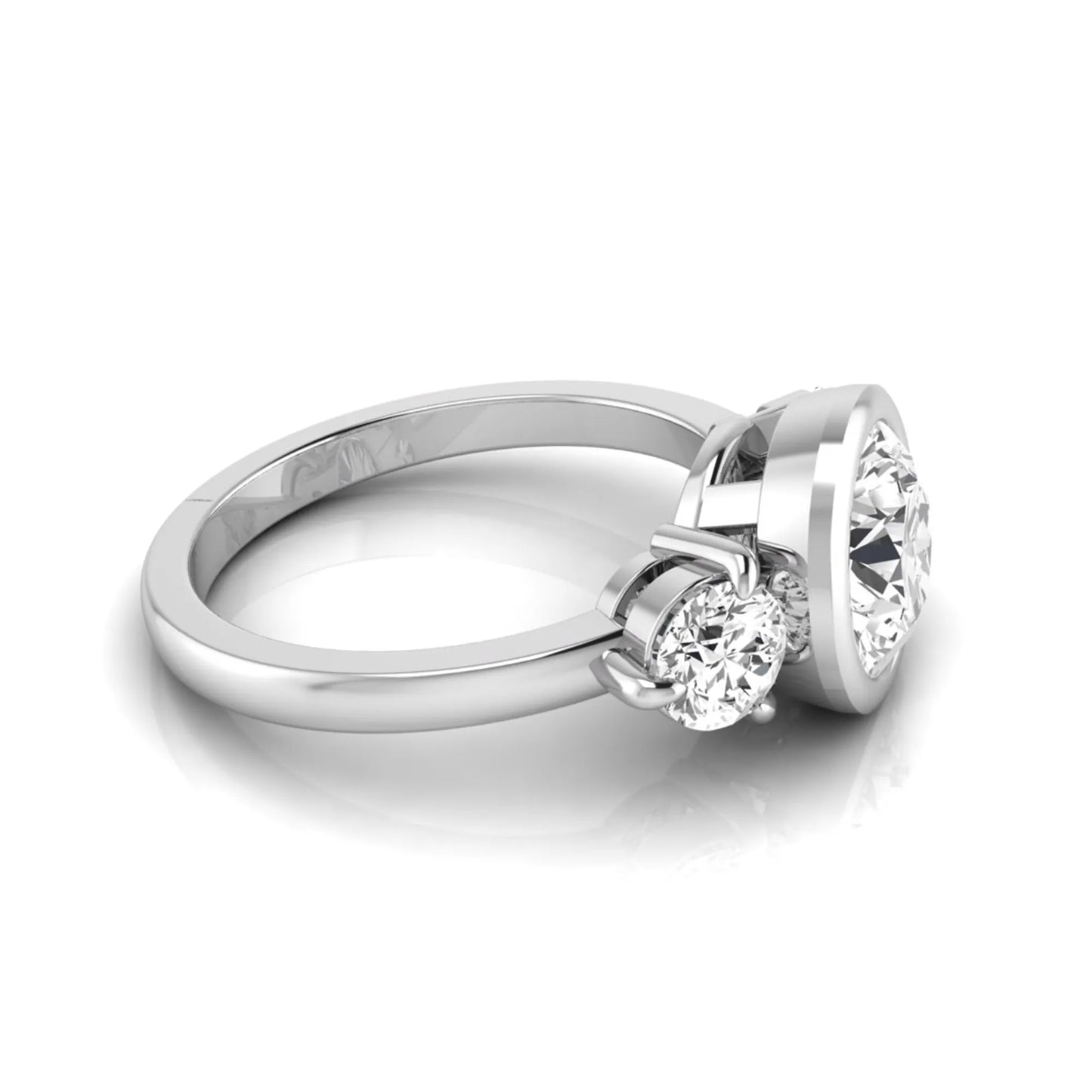 Round cut lab grown diamond three stone engagement ring with a bezel set center diamond and round side diamonds in white gold