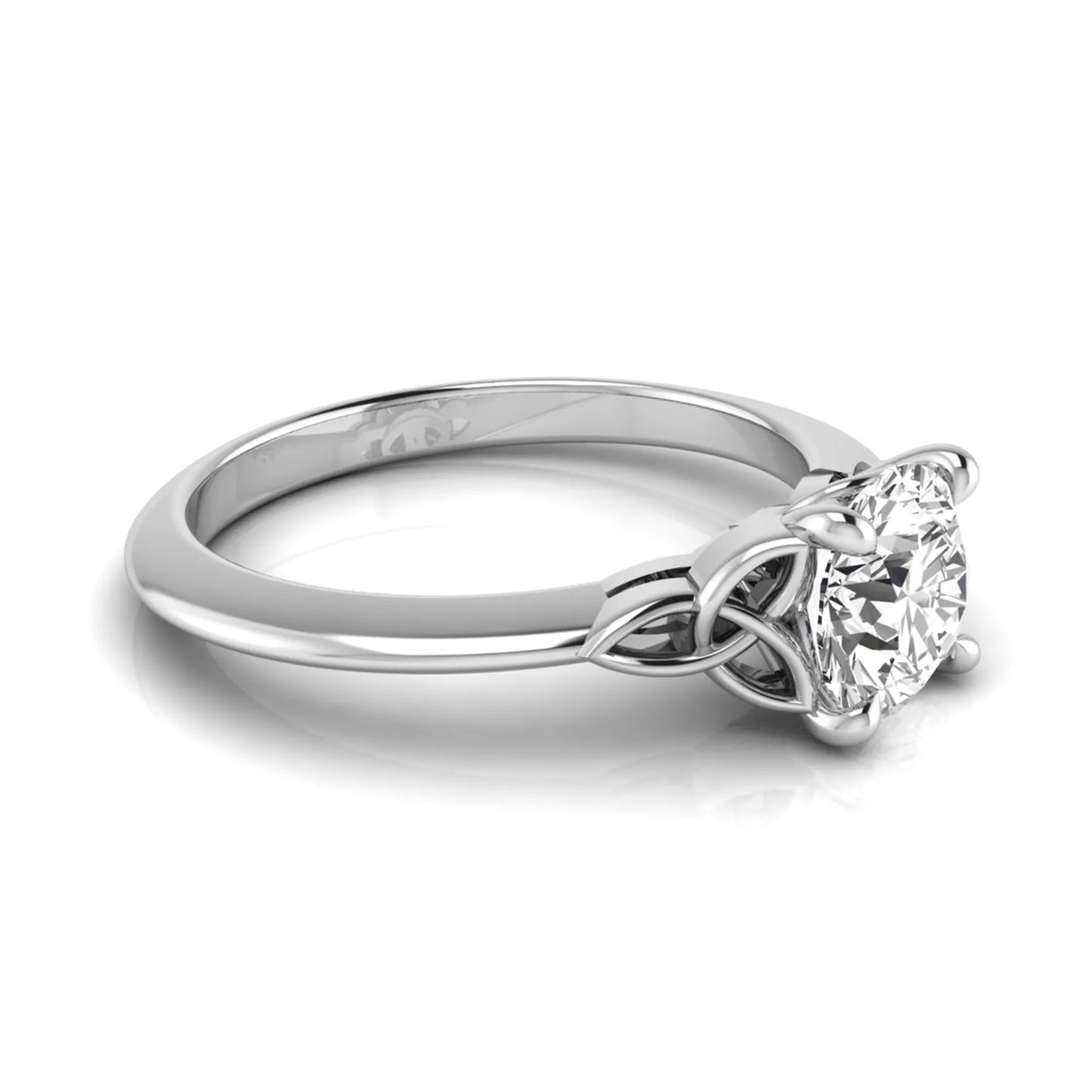 Round cut IGI certified lab grown diamond solitaire engagement ring featuring an elegant Celtic knot inspired gallery in a polished white gold setting.