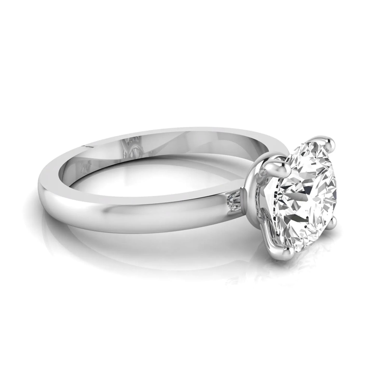 Round cut IGI certified 2.04 carat lab grown diamond solitaire engagement ring in white gold with a classic four-prong setting.