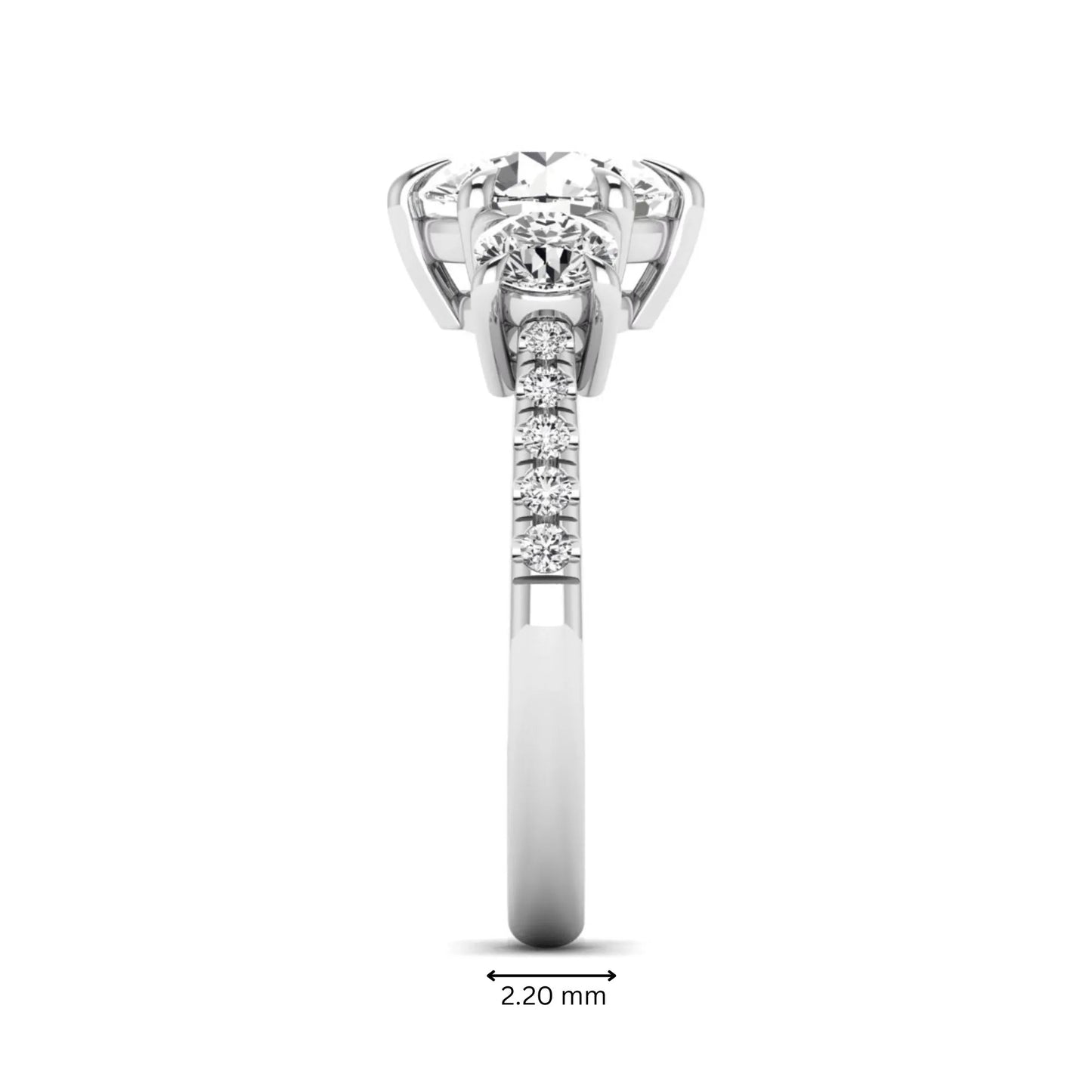 Round cut lab grown diamond three stone engagement ring with two round side diamonds and diamond accented shoulders in white gold