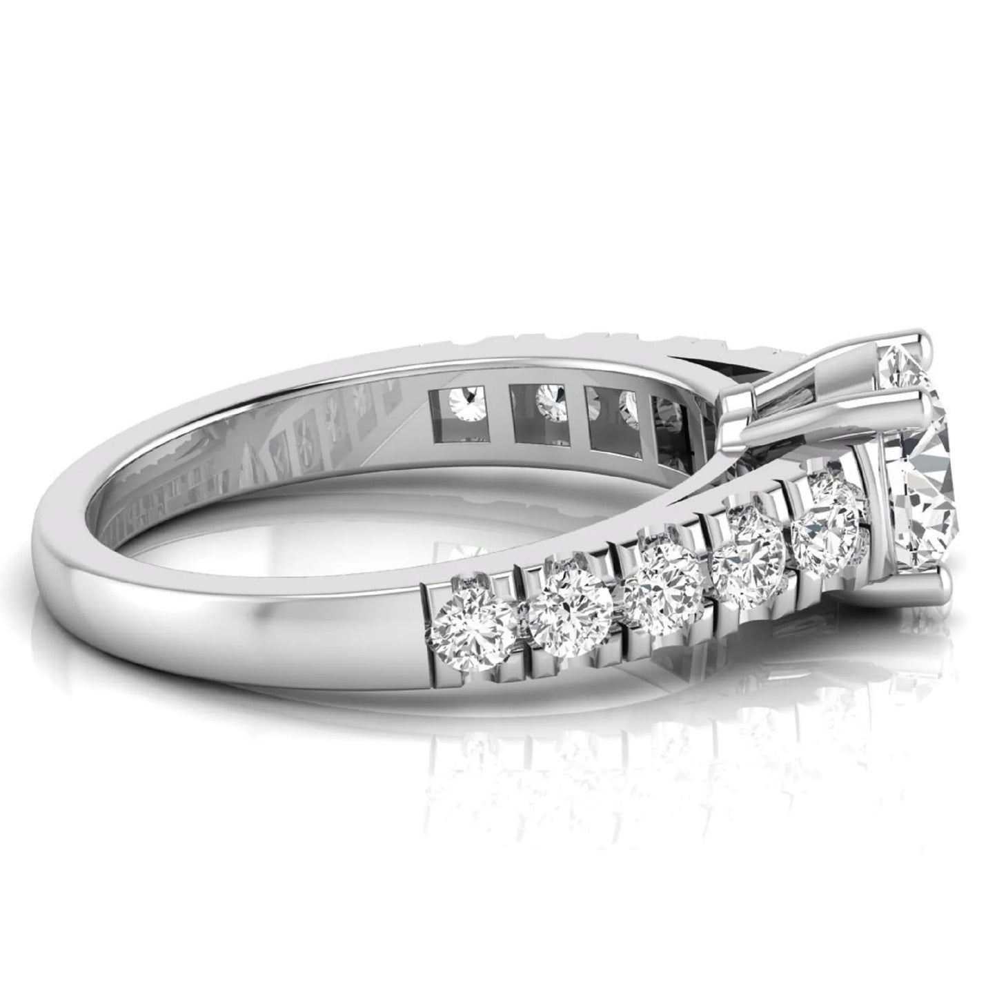 Round cut lab grown diamond side stone engagement ring featuring a four-prong setting with round accent diamonds in a white gold tone design.