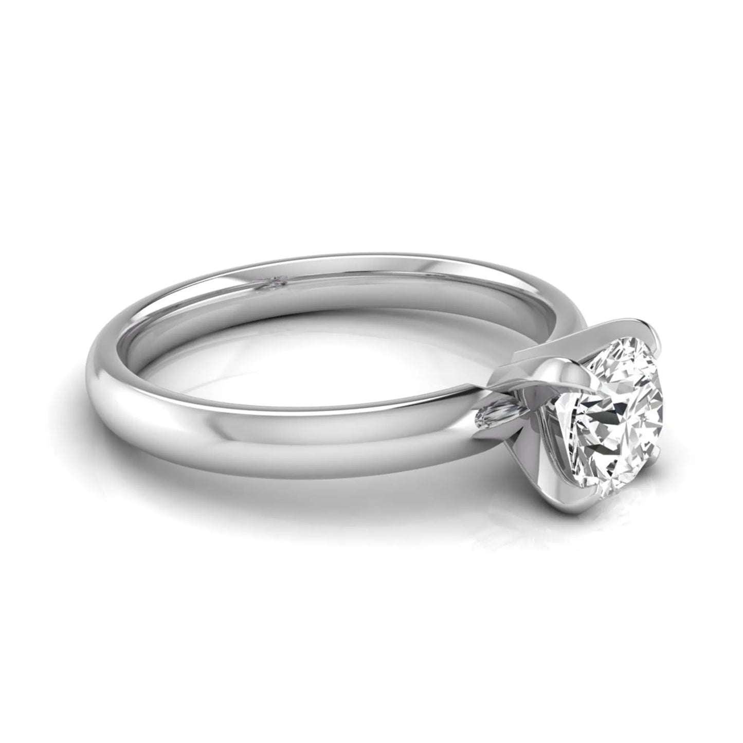 Round four prong lab grown diamond solitaire engagement ring featuring a 0.62 carat round center diamond in a classic four-prong setting in white gold