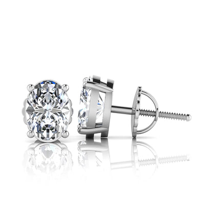 white gold Pair of lab grown diamond stud earrings on a white background