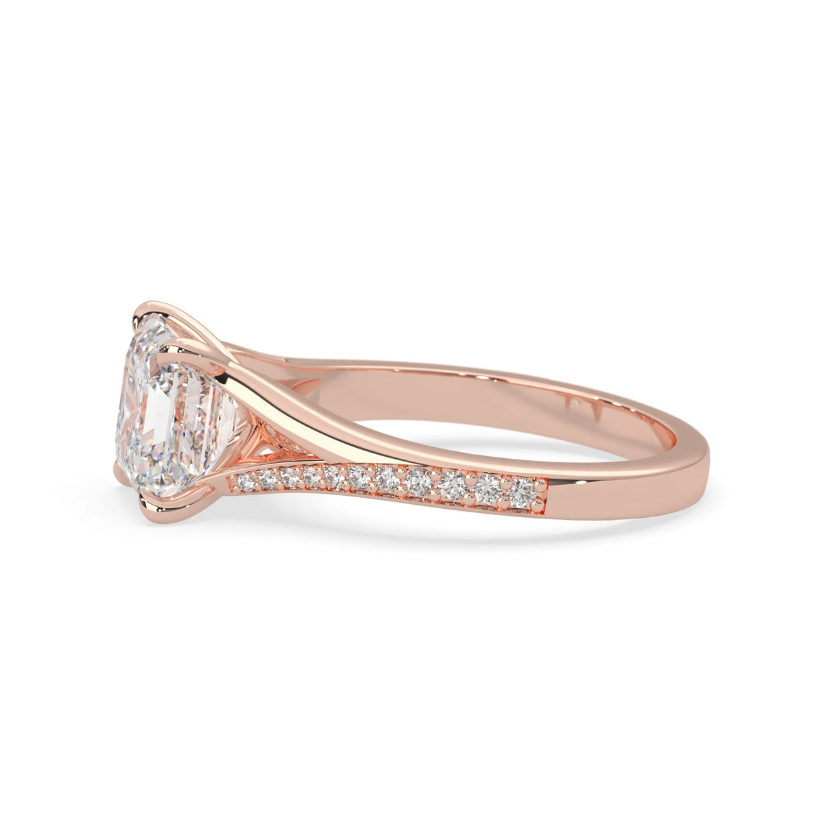 Rose gold ring with a diamond on a white background