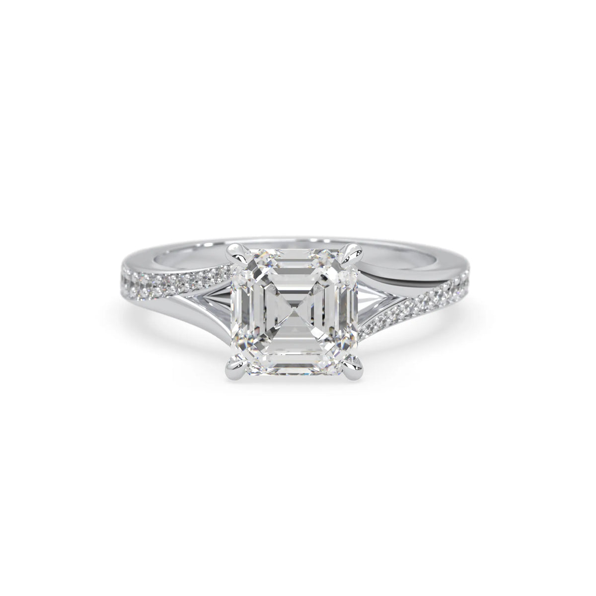 white gold Diamond ring with a central emerald-cut diamond and smaller diamonds on a white background