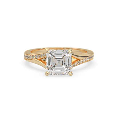 yellow Gold ring with a large diamond on a white background