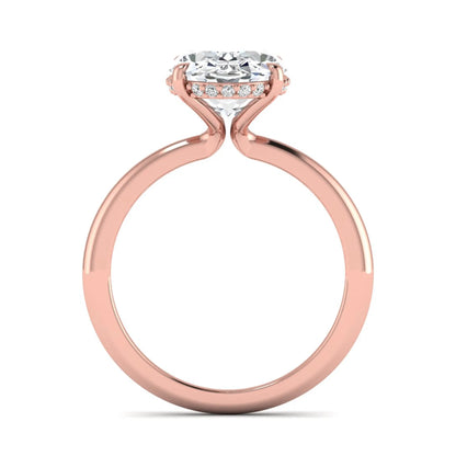 IGI certified oval cut lab grown diamond engagement ring featuring a four-prong setting with a hidden halo of round accent diamonds in rose gold tone.