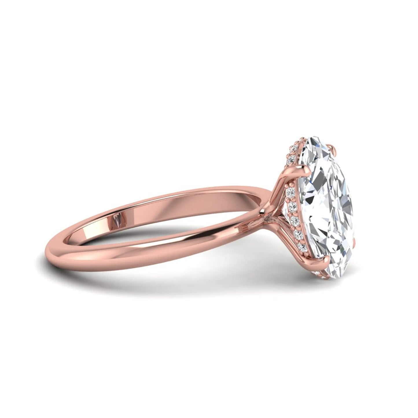 IGI certified oval cut lab grown diamond engagement ring featuring a four-prong setting with a hidden halo of round accent diamonds in rose gold tone.