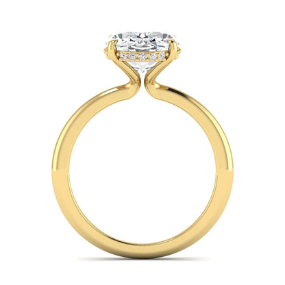 IGI certified oval cut lab grown diamond engagement ring featuring a four-prong setting with a hidden halo of round accent diamonds in yellow  gold tone.