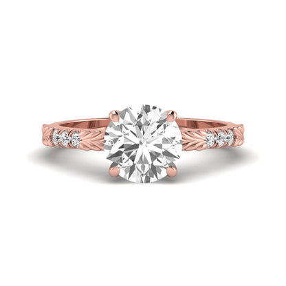 IGI certified round cut lab grown diamond engagement ring with a four-prong setting, vintage leaf-inspired band, and round accent diamonds in rose gold tone.
