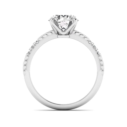 IGI certified round cut lab grown diamond engagement ring with a four-prong setting, vintage leaf-inspired band, and round accent diamonds in white gold tone.