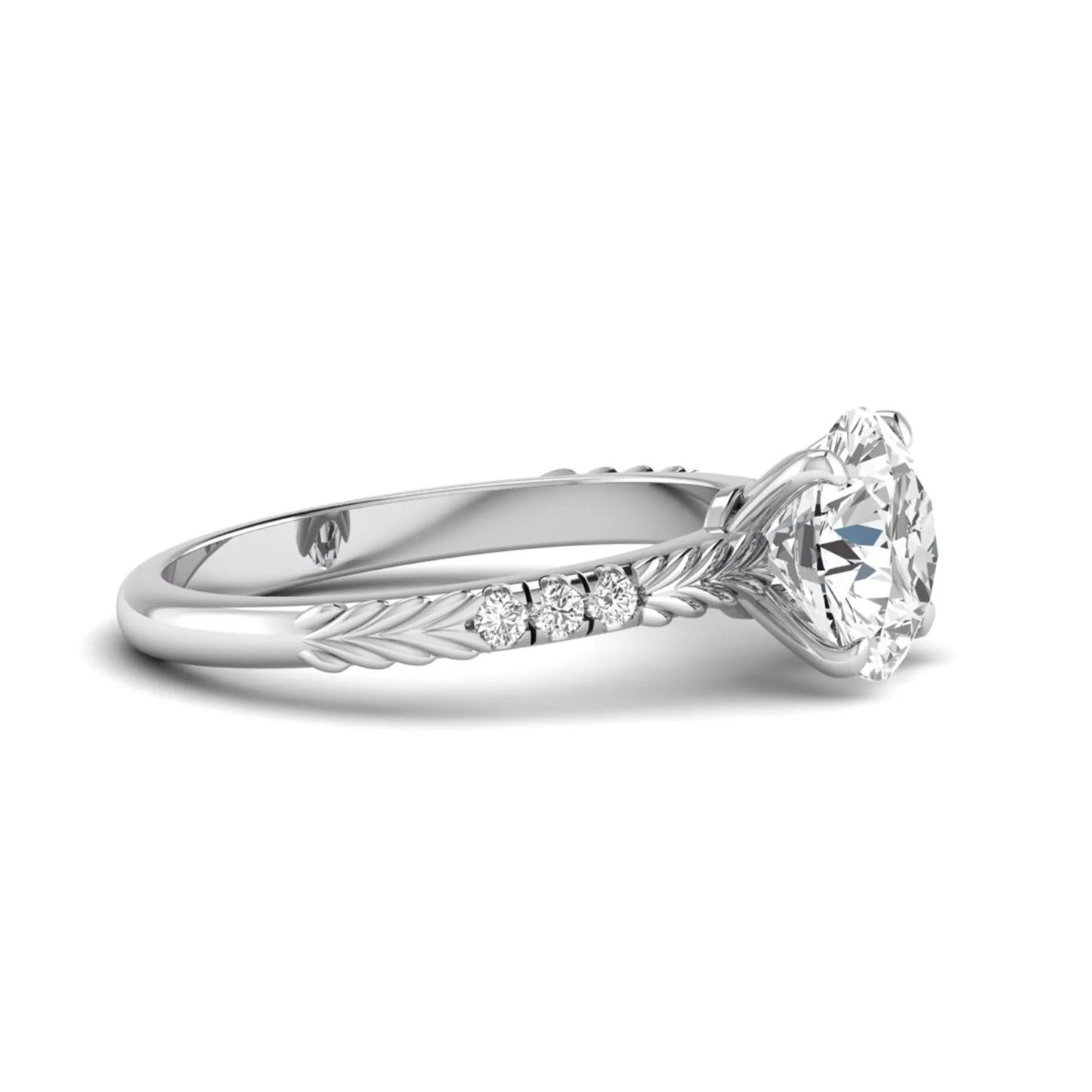 IGI certified round cut lab grown diamond engagement ring with a four-prong setting, vintage leaf-inspired band, and round accent diamonds in white gold tone.