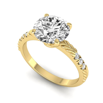 IGI certified round cut lab grown diamond engagement ring with a four-prong setting, vintage leaf-inspired band, and round accent diamonds in yellow gold tone.