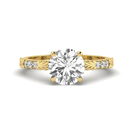 IGI certified round cut lab grown diamond engagement ring with a four-prong setting, vintage leaf-inspired band, and round accent diamonds in yellow gold tone.