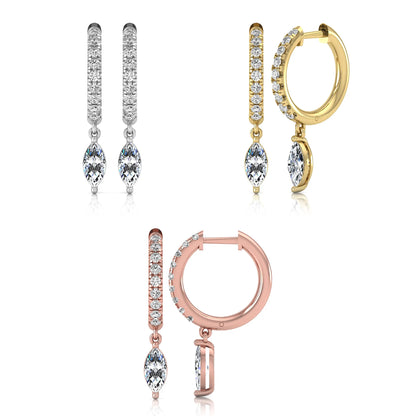 Set of four pairs of earrings in  gold and platinum on a white background