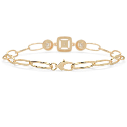 yellow Gold bracelet with lab grown diamond accents on a white background