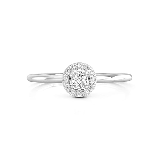 Diamond ring with a halo setting on a white background
