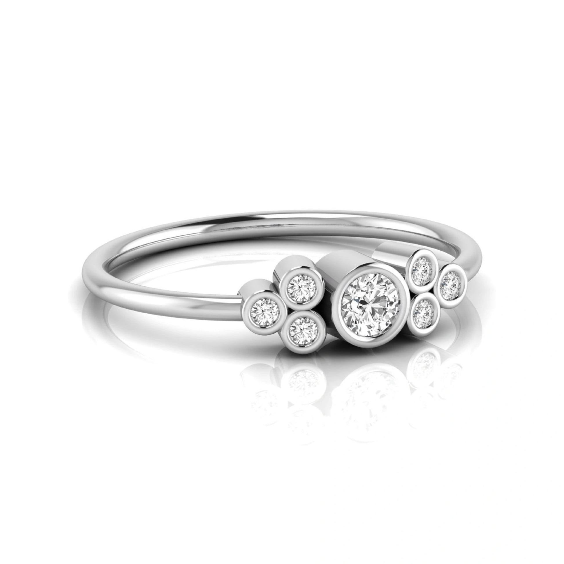 white-gold ring with diamond accents on a white background