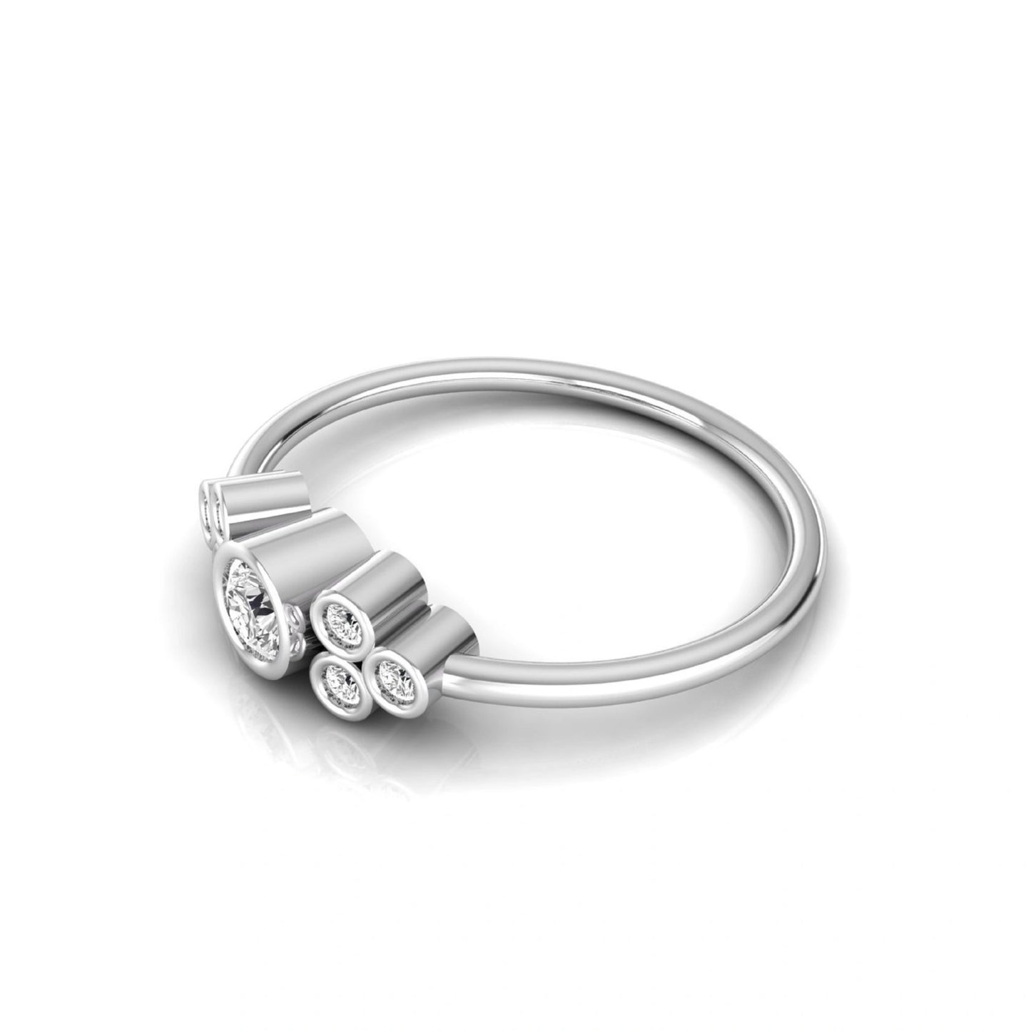 white-gold ring with three circular gemstones on a white background