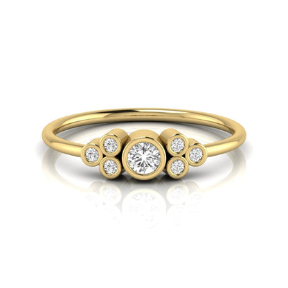 yellow-Gold ring with circular design and embedded diamonds on a white background
