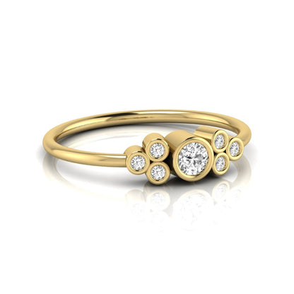 yellow-Gold ring with diamond accents on a white background