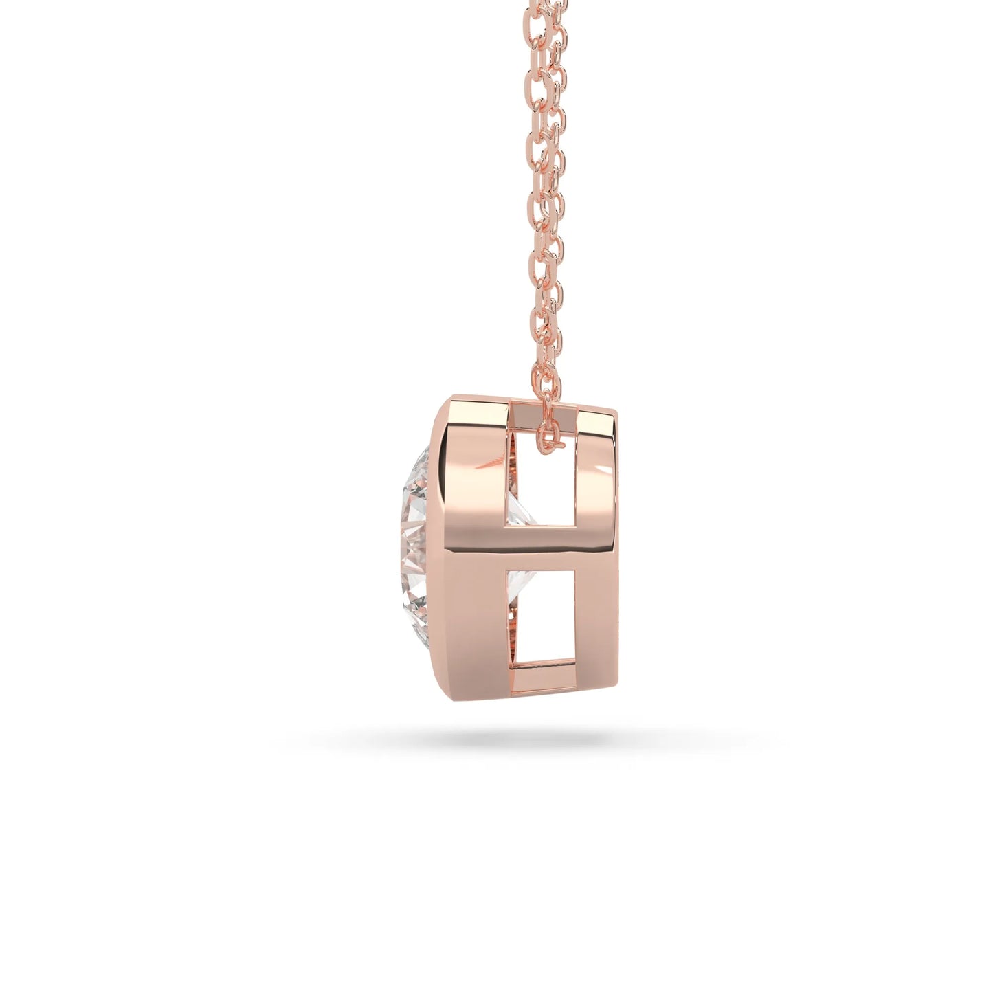 Round brilliant lab grown diamond solitaire pendant necklace in bezel setting with rose gold tone design and cable chain.
