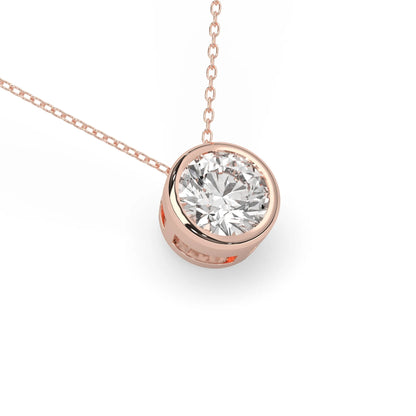 Round brilliant lab grown diamond solitaire pendant necklace in bezel setting with rose gold tone design and cable chain.