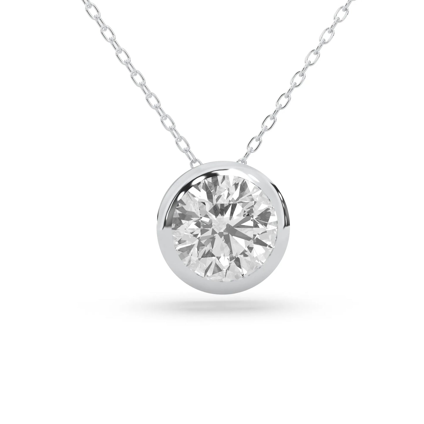 Round brilliant lab grown diamond solitaire pendant necklace in bezel setting with white gold tone design and cable chain.