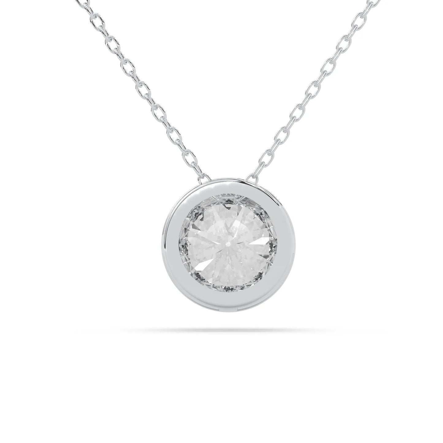 Round brilliant lab grown diamond solitaire pendant necklace in bezel setting with white gold tone design and cable chain.