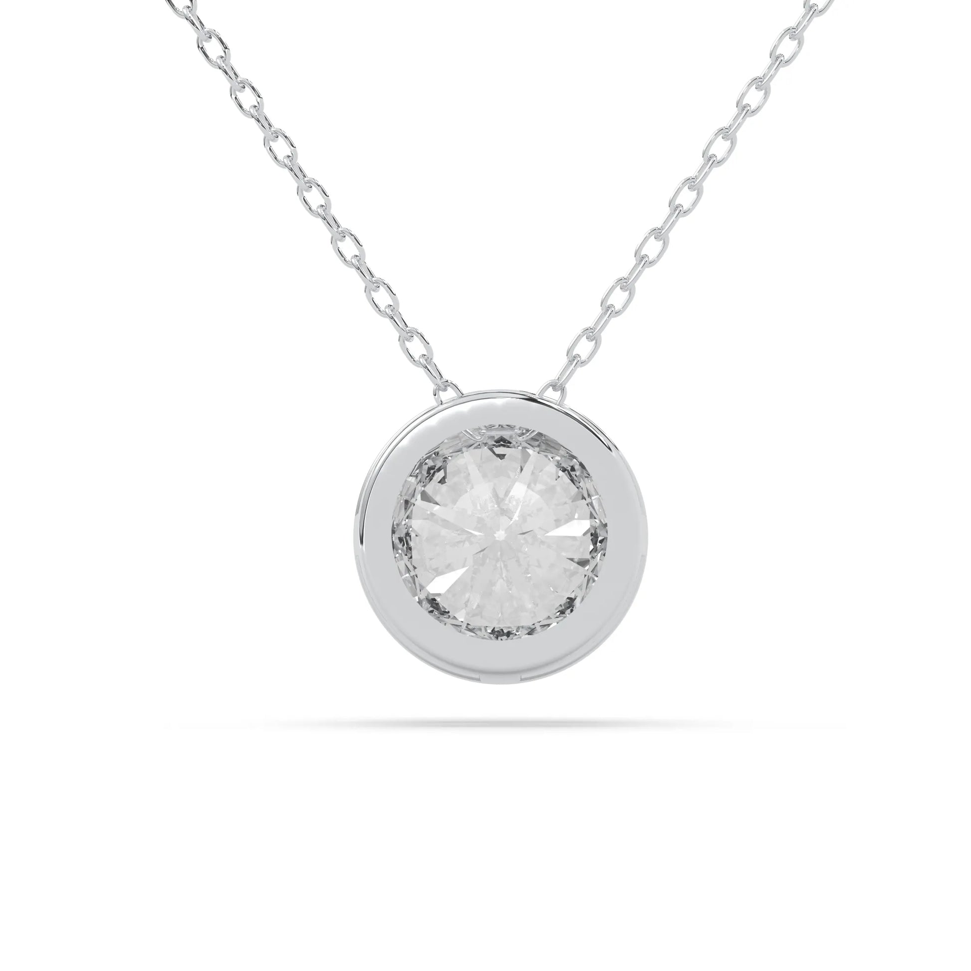 Round brilliant lab grown diamond solitaire pendant necklace in bezel setting with white gold tone design and cable chain.