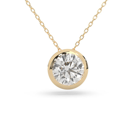 Round brilliant lab grown diamond solitaire pendant necklace in bezel setting with yellow gold tone design and cable chain.