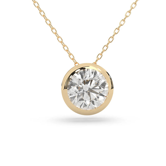 Round brilliant lab grown diamond solitaire pendant necklace in bezel setting with yellow gold tone design and cable chain.