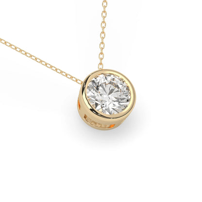 Round brilliant lab grown diamond solitaire pendant necklace in bezel setting with yellow gold tone design and cable chain.