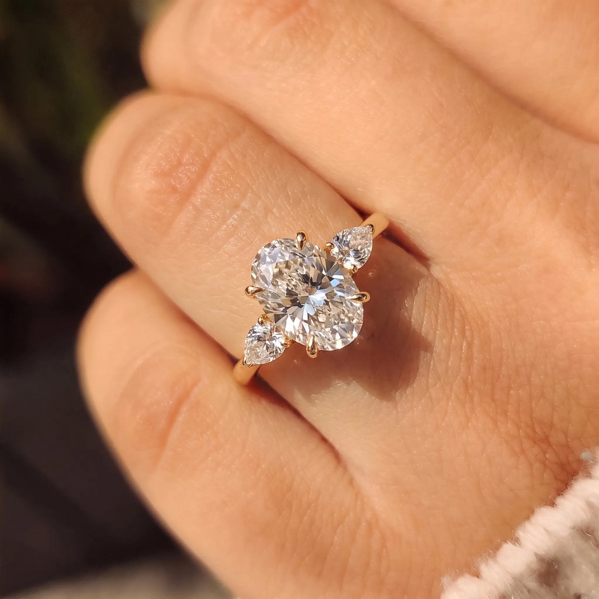 2.5 Carat Oval Cut Lab Grown Diamond Three Stone Engagement Ring